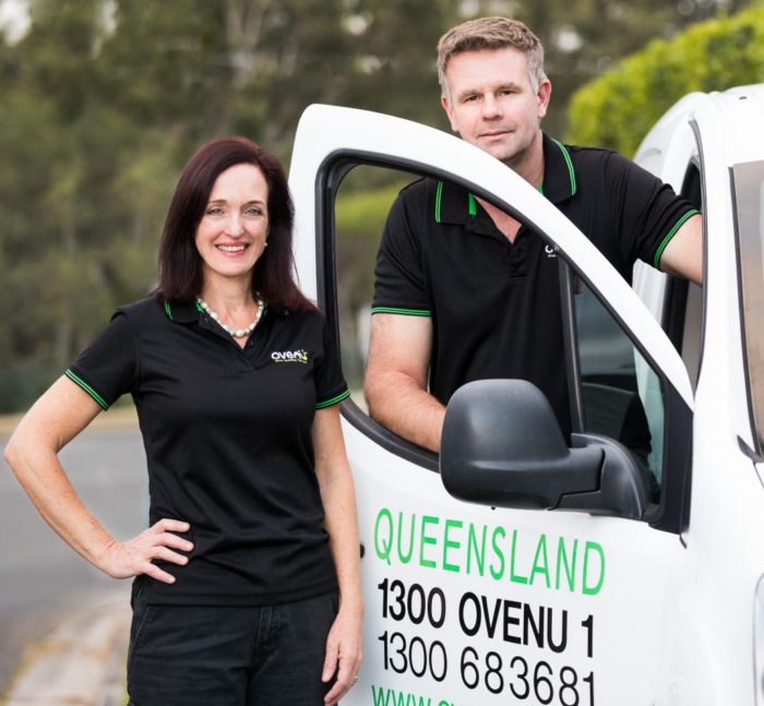 Professional oven cleaners stood outside with Ovenu van
